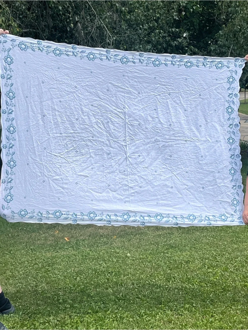 Embroidered White Linen tablecloth with blue flowers Motif